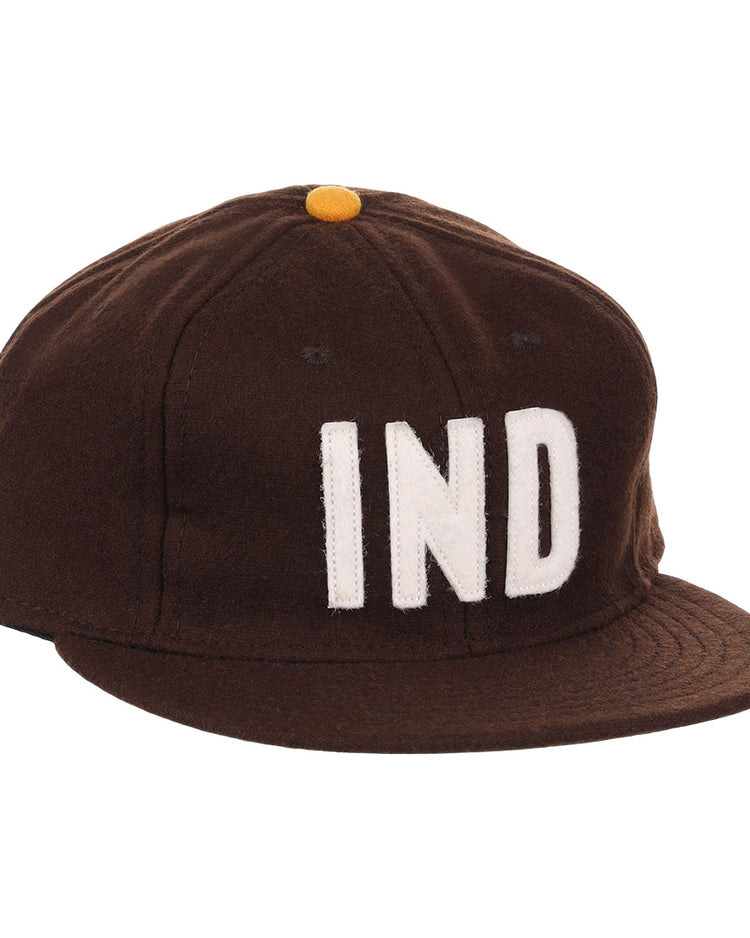 The EFF Independent Subway System 1939 Vintage Ballcap is a genuine wool brown cap with a yellow top button and bold white IND letters, inspired by the historic 1939 subway ballcap.