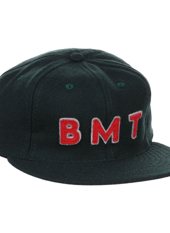 The EFF Brooklyn Manhattan Transit Company 1939 Vintage Ballcap is a black wool cap featuring raised red and white BMT embroidery on the front, inspired by an original 1939 Brooklyn ballcap for authentic vintage style.