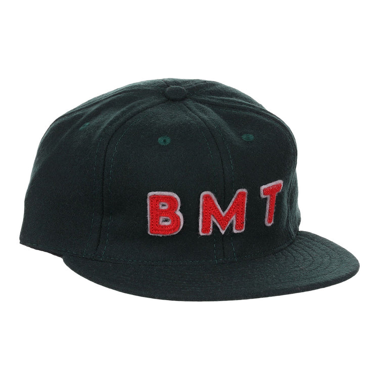 The EFF Brooklyn Manhattan Transit Company 1939 Vintage Ballcap is a black wool cap featuring raised red and white BMT embroidery on the front, inspired by an original 1939 Brooklyn ballcap for authentic vintage style.
