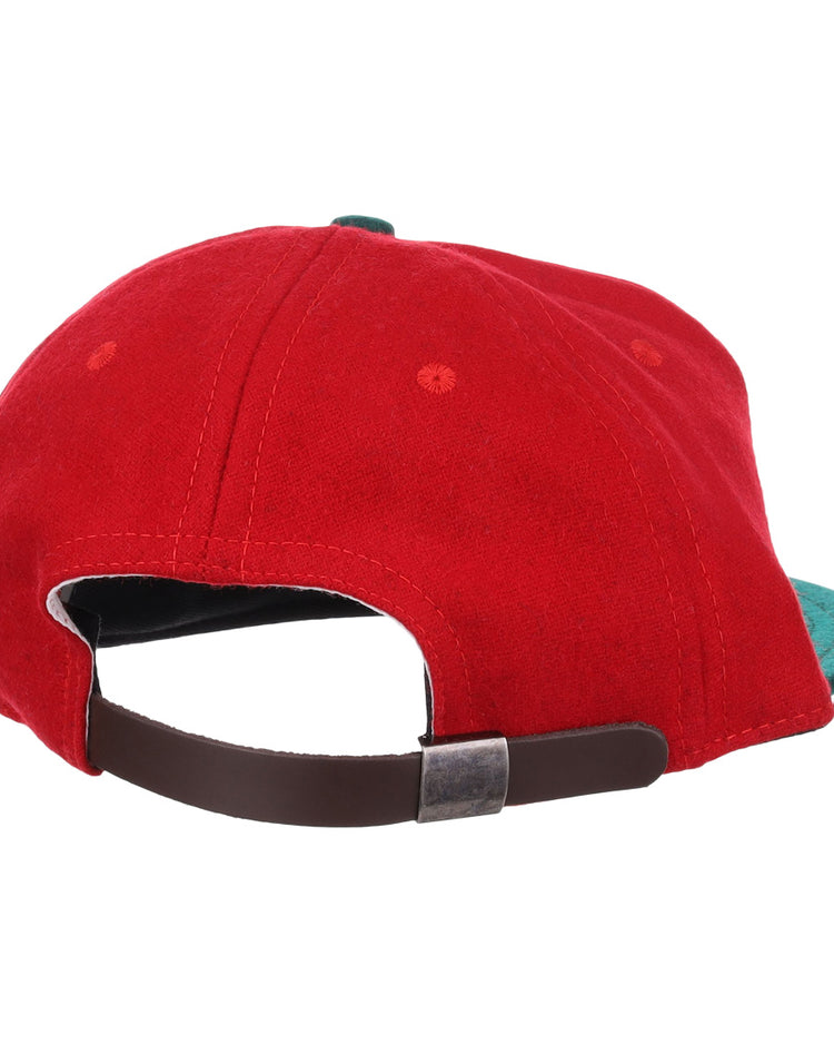 The EFF M&O Cigars 1946 Vintage Ballcap is shown from the back, highlighting its brown adjustable strap with a metallic buckle and a green bill peeking out on the right.