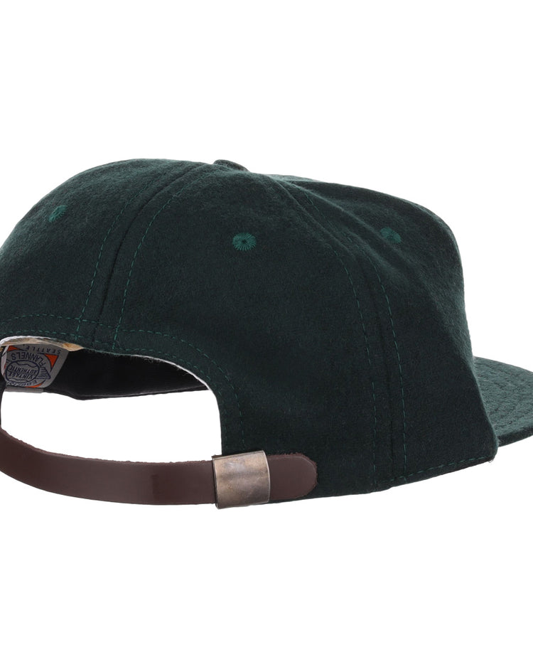 The EFF Brooklyn Manhattan Transit Company 1939 Vintage Ballcap is a dark green wool cap inspired by vintage BMT hats, seen from the back, with a brown leather adjustable strap and metal clasp for size adjustment.