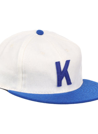 The EFF University of Kentucky 1968 Vintage Ballcap features a white crown, blue brim, button, vents, and a bold blue K—ideal for fans of classic collegiate baseball hats.