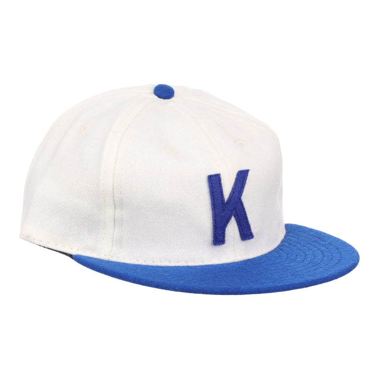 The EFF University of Kentucky 1968 Vintage Ballcap features a white crown, blue brim, button, vents, and a bold blue K—ideal for fans of classic collegiate baseball hats.
