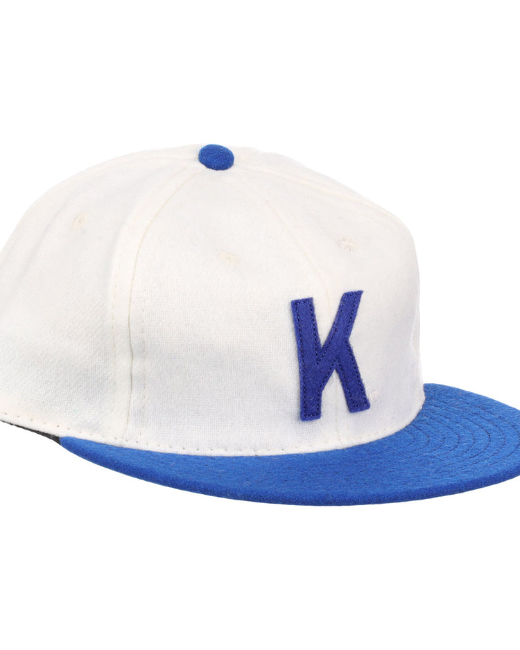The EFF University of Kentucky 1968 Vintage Ballcap features a white crown, blue brim, button, vents, and a bold blue K—ideal for fans of classic collegiate baseball hats.