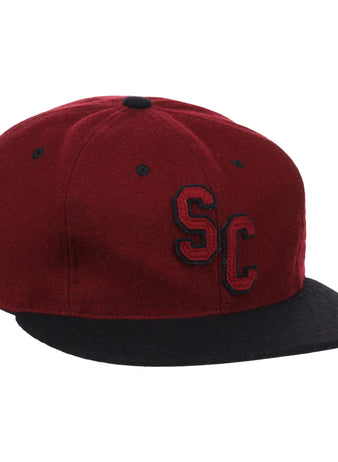 The EFF University of South Carolina Gamecocks Vintage Ballcap is a maroon wool cap with a black brim, featuring SC in black with white outline on the front; an officially licensed College Vault product.