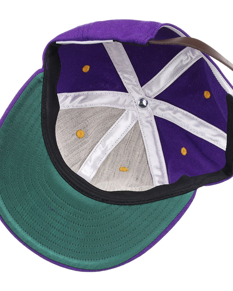 The EFF Louisiana State University Vintage Ballcap has a green underside brim, white interior seams, yellow stitching, and an adjustable brown strap—an ideal addition to any LSU Tigers hat collection.