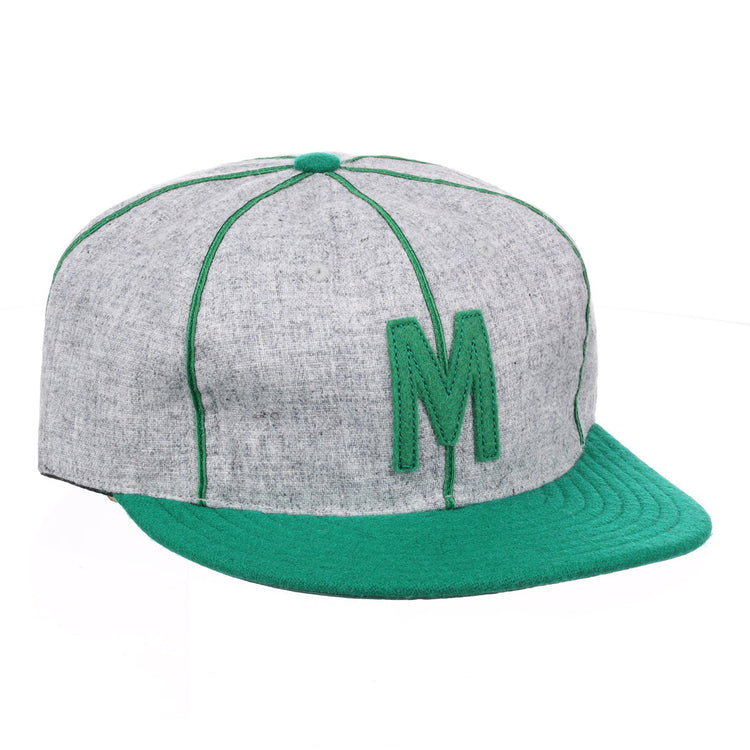 The EFF Manhattan College 1932 Vintage Ballcap features genuine wool in gray and green, with a green letter M, matching stitching, brim, and top button.