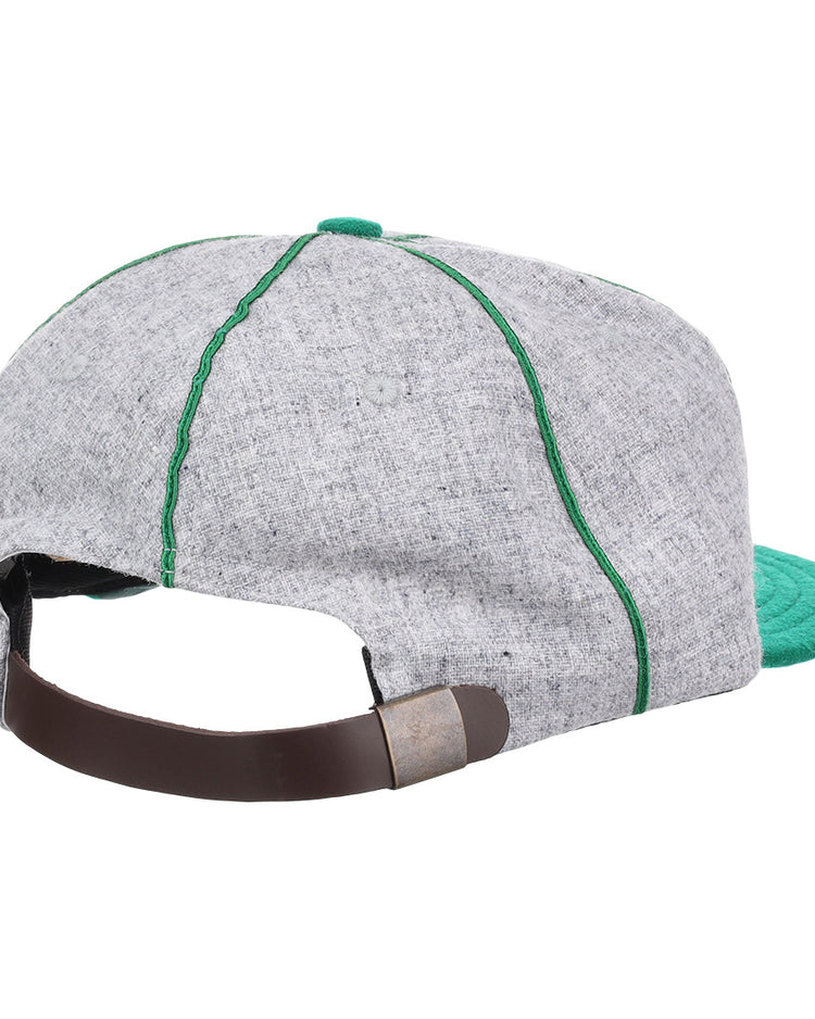The EFF Manhattan College 1932 Vintage Ballcap is crafted from genuine wool baseball cloth in gray, with green stitching, a green brim, and an adjustable brown leather strap with metal clasp.