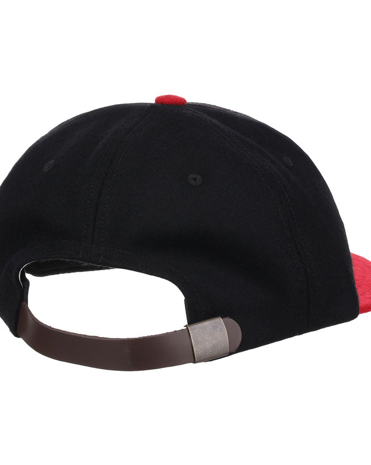 The EFF Rutgers University 1955 Vintage Ballcap is a black wool cap with a red button and brim, featuring a brown adjustable strap with metal clasp for a timeless look, shown here from the back.