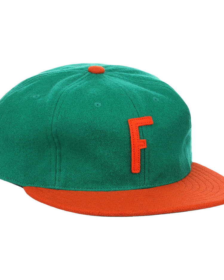 The EFF Florida A&M University 1969 Vintage Ballcap is a green wool baseball cap with an orange brim and button, showcasing a raised orange F on the front—an authentic throwback to the classic 1969 FAMU style.