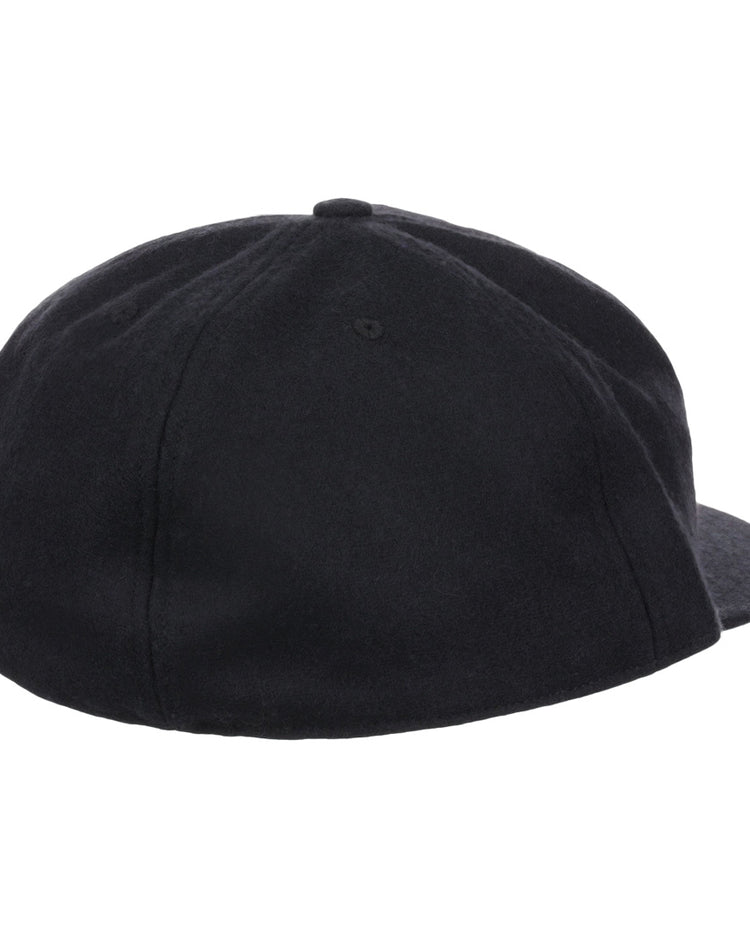 The EFF Grambling State University 1963 Vintage Ballcap is a black wool cap with a smooth, unadorned back and small top button—ideal for fans of classic HBCU style.