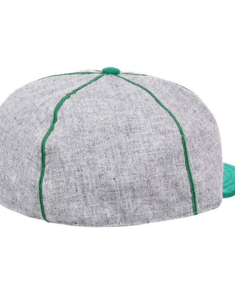 The EFF Manhattan College 1932 Vintage Ballcap is made from authentic gray wool baseball cloth and features green stitching, a green top button, and a partially visible green brim. Shown from the back.