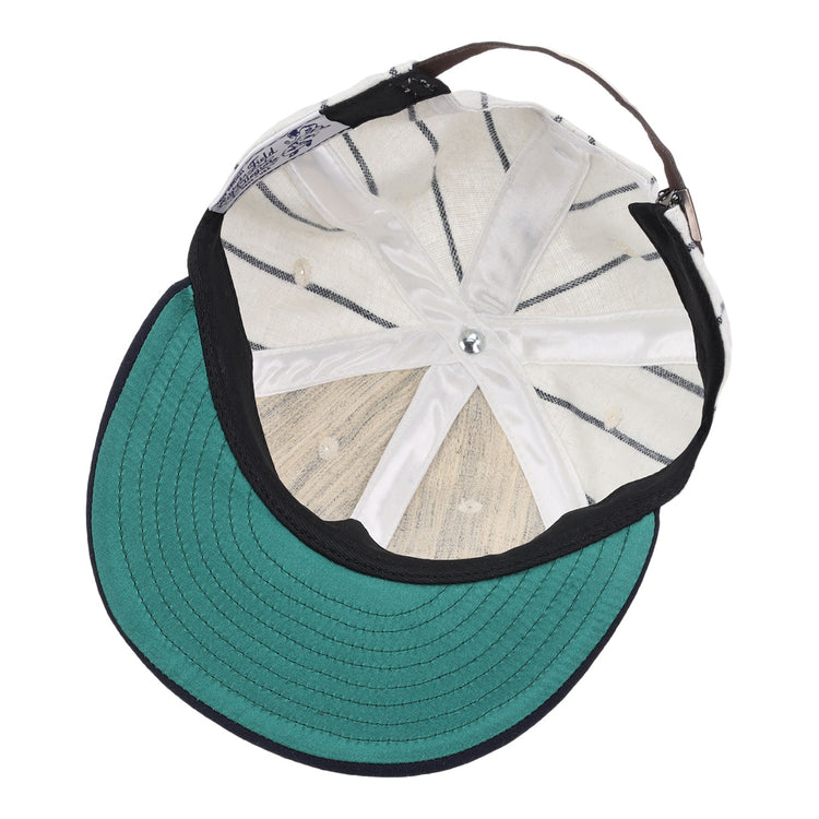A look inside the EFF Duke University Pinstripe Script Vintage Ballcap shows a green underside brim, white panels with black stitching, ventilation holes, and an adjustable brown strap—an authentic 1968 reproduction.