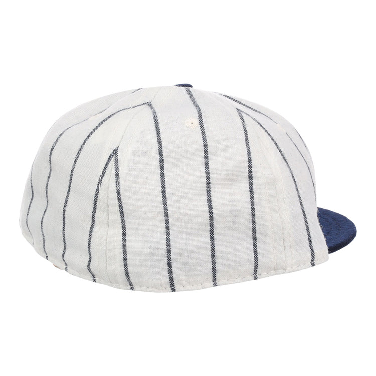 The EFF Duke University Pinstripe Script Vintage Ballcap features navy blue pinstripes, a solid navy brim, and is an authentic 1968 reproduction shown from the rear side angle.