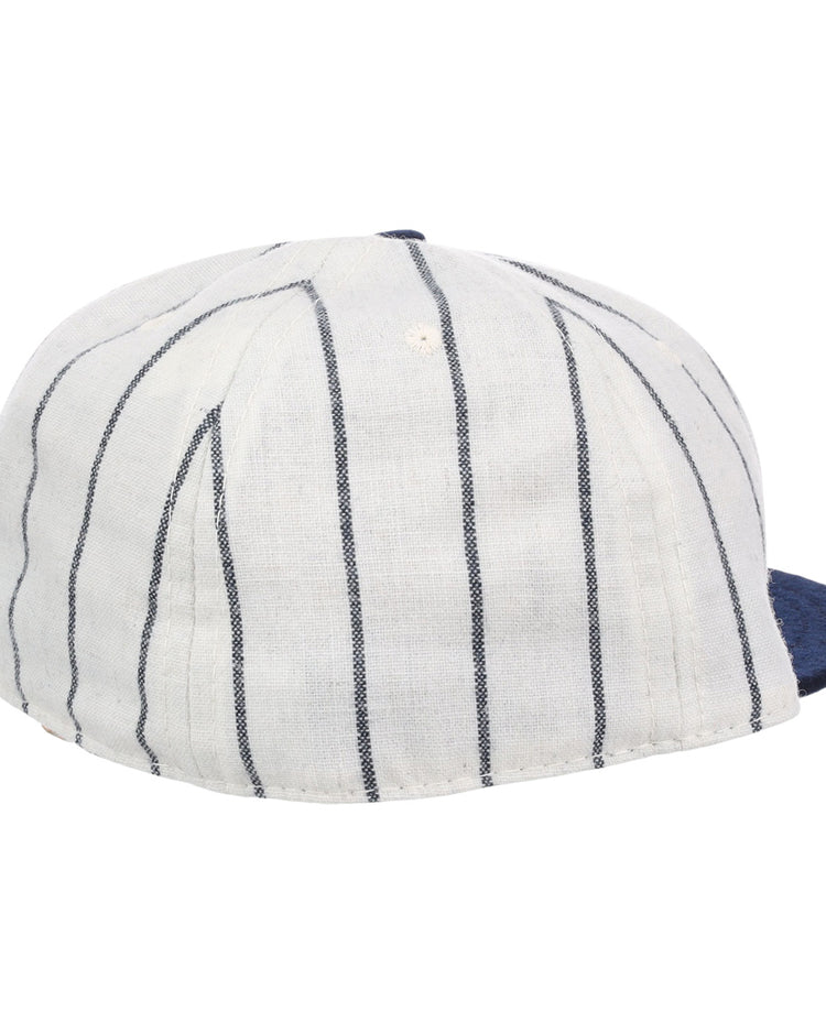 The EFF Duke University Pinstripe Script Vintage Ballcap features navy blue pinstripes, a solid navy brim, and is an authentic 1968 reproduction shown from the rear side angle.