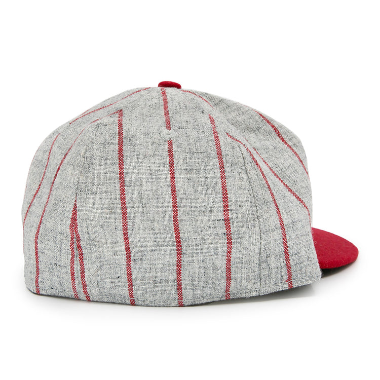 The Club Artemisa 1943 Vintage Ballcap by Ebbets Field Flannels features gray wool with vertical red stripes, a solid red brim, and a classic back view inspired by the Cuban National Amateur League.