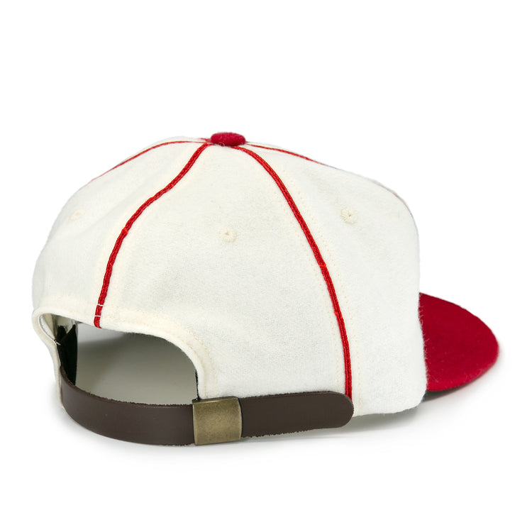 The EFF Asahi Vancouver 1940 Vintage Ballcap features red stitching, a red brim, and a brown leather strap with brass buckle—ideal for collectors or fans of Japanese-Canadian teams. Shown from the back.