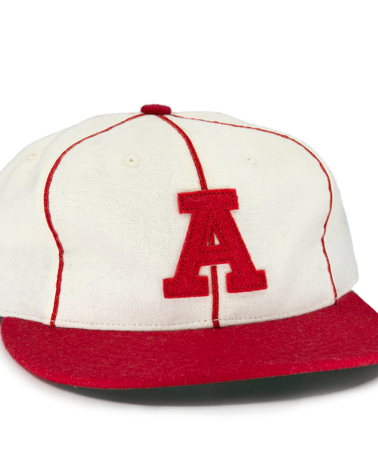 The EFF Asahi Vancouver 1940 Vintage Ballcap features red stitching, a red brim, and a bold red “A,” inspired by the iconic caps worn by the legendary Japanese-Canadian team.