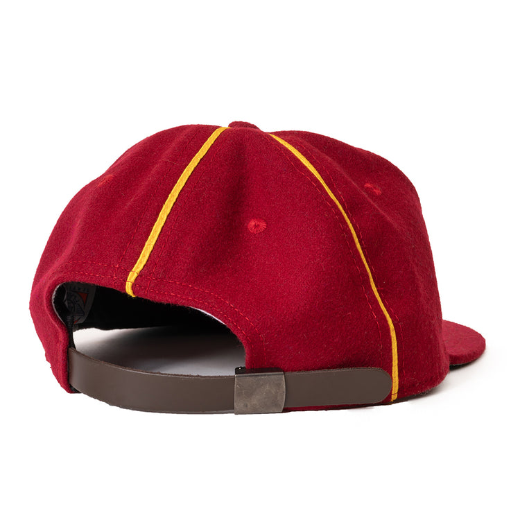 The Ebbets Field Flannels Club Bacardi 1930 Vintage Ballcap is a red genuine wool cap, shown from the back with yellow stripes and an adjustable brown strap, inspired by the Cuban National Amateur League.