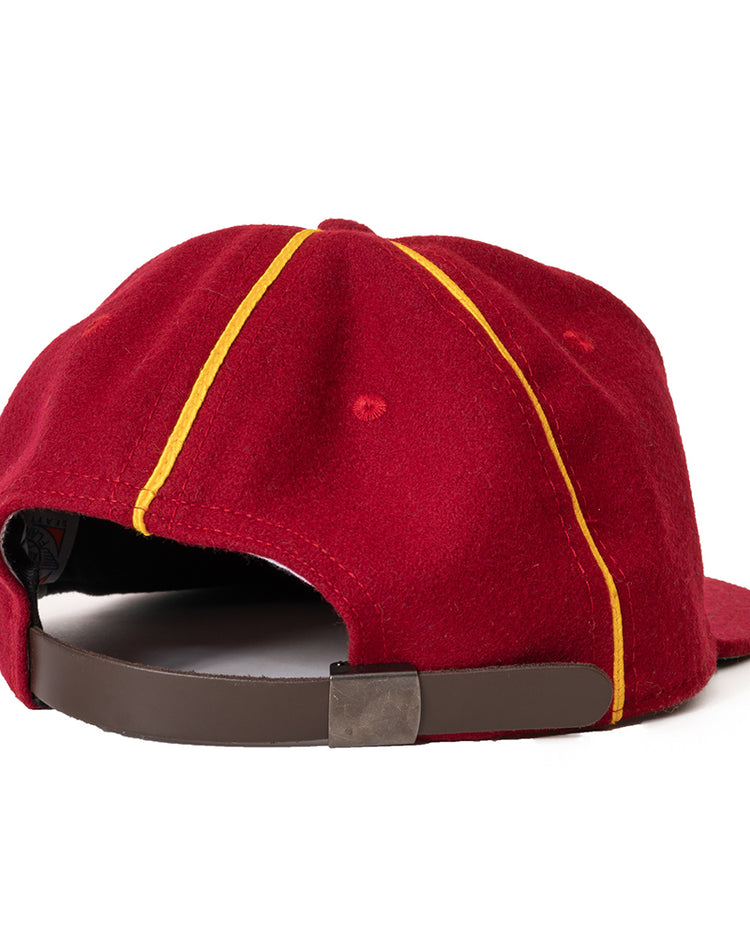 The Ebbets Field Flannels Club Bacardi 1930 Vintage Ballcap is a red genuine wool cap, shown from the back with yellow stripes and an adjustable brown strap, inspired by the Cuban National Amateur League.