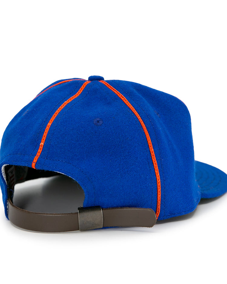 The EFF Boston Bloomer Girls 1910 Vintage Ballcap is shown from the back, highlighting orange stitching and an adjustable dark strap with a metal buckle—a tribute to womens baseball history.