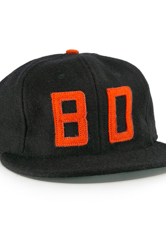 The EFF Bisbee-Douglas Copper Kings 1951 Vintage Ballcap features bold orange “BO” letters stitched on the front and an orange top button, crafted from classic wool for a timeless look.