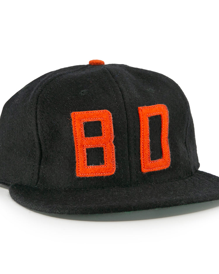 The EFF Bisbee-Douglas Copper Kings 1951 Vintage Ballcap features bold orange “BO” letters stitched on the front and an orange top button, crafted from classic wool for a timeless look.