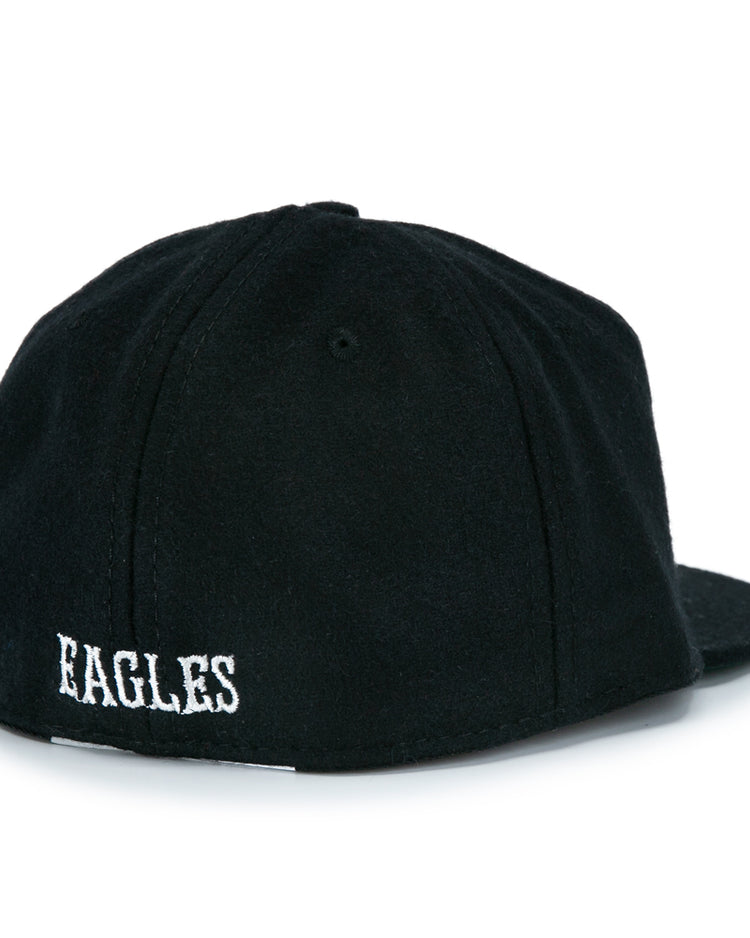 The EFF Brooklyn Eagles Vintage Inspired Ballcap is shown from the back, with EAGLES embroidered in white above the opening—a timeless pick for vintage baseball hat fans.
