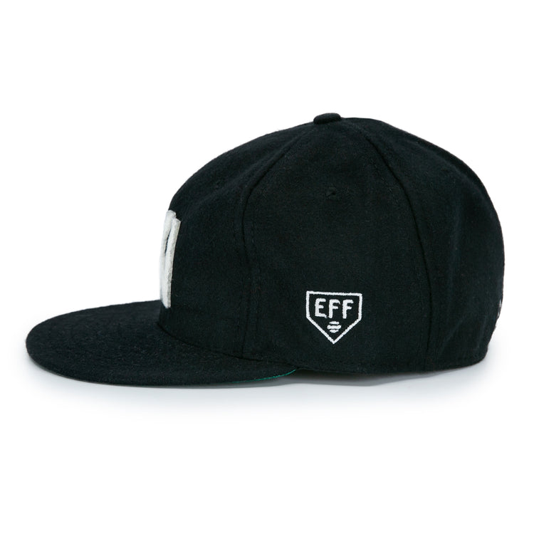 The EFF Brooklyn Eagles Vintage Inspired Ballcap is a black baseball hat with a small white embroidered EFF shield logo on the side, channeling classic Brooklyn Eagles style.