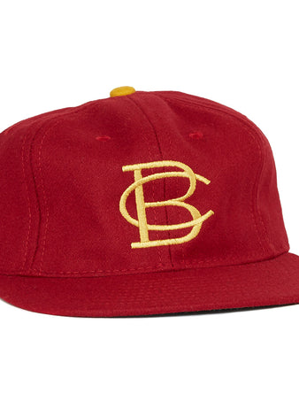 The EFF Boston College 1966 Vintage Ballcap features a red design, a yellow BC logo embroidered on the front, and a yellow top button—an authentic reproduction of the classic Eagles cap.