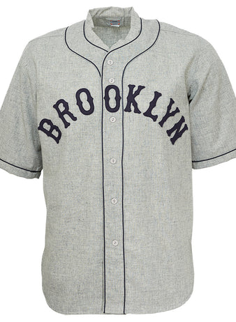 The EFF Brooklyn Eagles 1935 Road Jersey is a gray short-sleeve button-up with black piping and large black BROOKLYN lettering, inspired by the original Negro National League teams design.