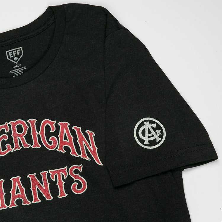 The EFF Chicago American Giants T-Shirt features black fabric with red and white AMERICAN GIANTS text on the chest and a circular white interlocking logo on the left sleeve, celebrating the legendary Black baseball team.