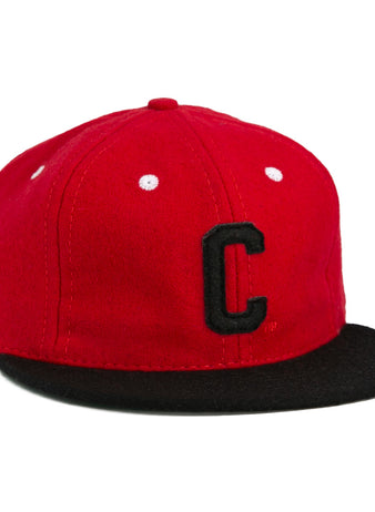 The University of Cincinnati 1960 Vintage Ballcap by Ebbets Field Flannels is a red cap with a black bill, white stitching, and a bold black “C,” authentically reproducing the classic look of the original.