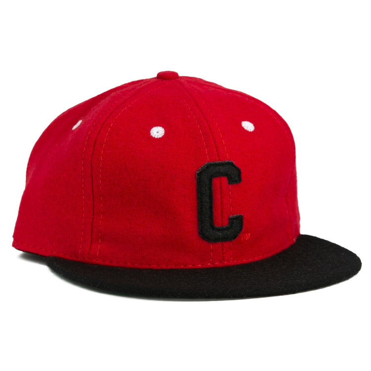 The University of Cincinnati 1960 Vintage Ballcap by Ebbets Field Flannels is a red cap with a black bill, white stitching, and a bold black “C,” authentically reproducing the classic look of the original.