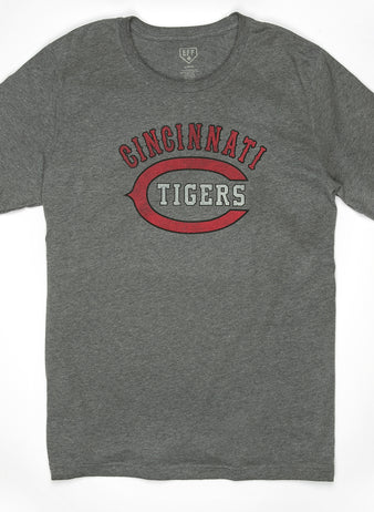 The EFF Cincinnati Tigers 1934 T-Shirt is a gray tee featuring Cincinnati Tigers in red and white letters and a large red C, honoring the legendary Negro American League team.