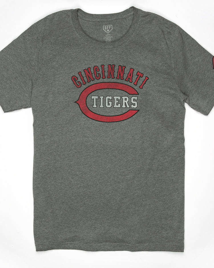 The EFF Cincinnati Tigers 1934 T-Shirt is a gray tee featuring Cincinnati Tigers in red and white letters and a large red C, honoring the legendary Negro American League team.