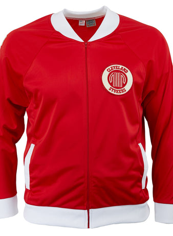 The Cleveland Stokers 1967 Soccer Jacket by EFF is a red zip-up with white cuffs, waistband, and collar, plus a circular team logo on the left chest—a classic United Soccer Association style made in the USA.