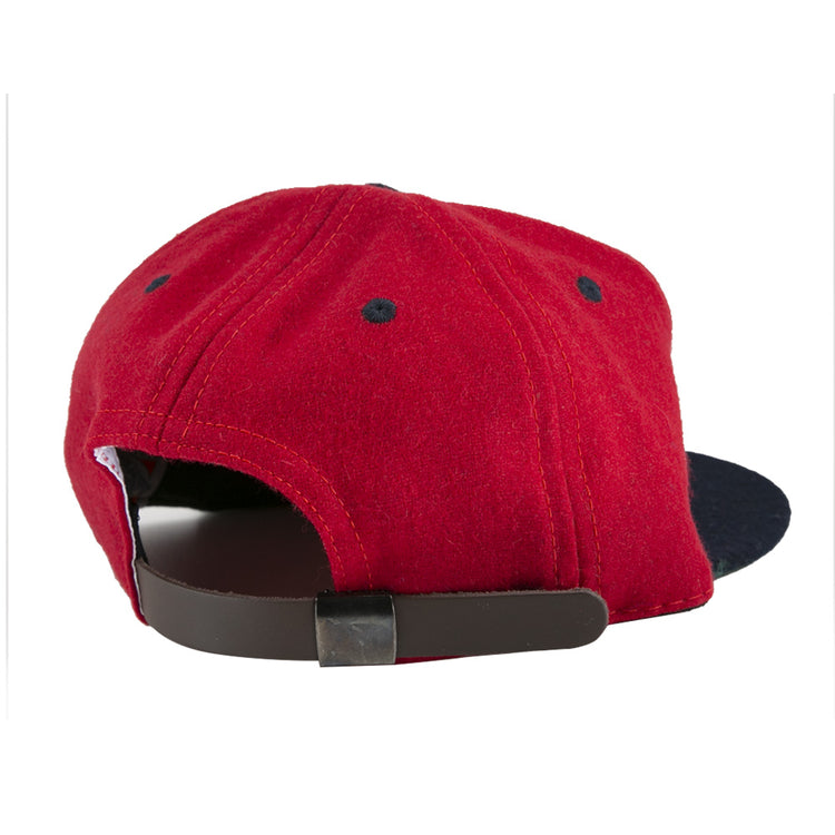 The EFF Deland Red Hats 1939 Vintage Ballcap in red features black ventilation eyelets and an adjustable black strap with metal clasp, crafted from genuine wool baseball cloth in classic ballcap style.