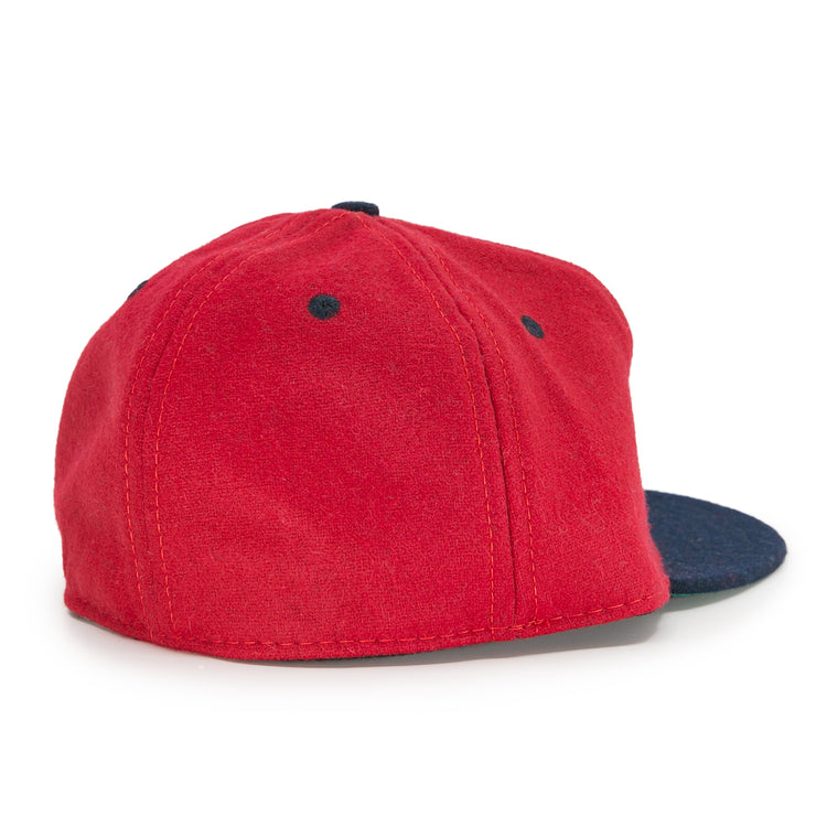 The EFF Deland Red Hats 1939 Vintage Ballcap features a red wool crown with a dark blue brim, shown from the back and side on a white background. Ideal for vintage ballcap collectors.