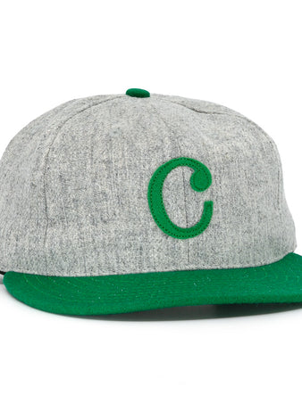 The Ebbets Field Flannels Cienfuegos Elefantes 1946 Vintage Ballcap is a gray wool cap with a green brim and an embroidered green “C,” inspired by the classic Cuban Professional League team.