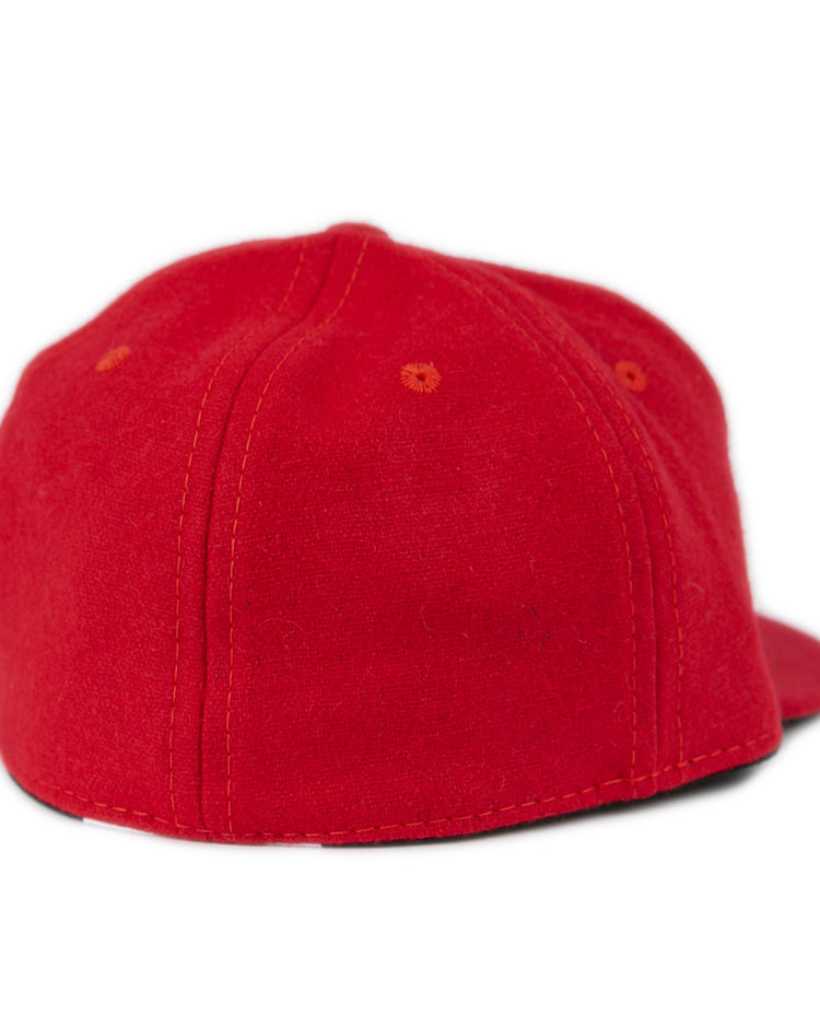 A Fresno State University 1951 Vintage Ballcap by Ebbets Field Flannels in bright red, shown from the back with visible stitching and a flat brim turned away from the camera.