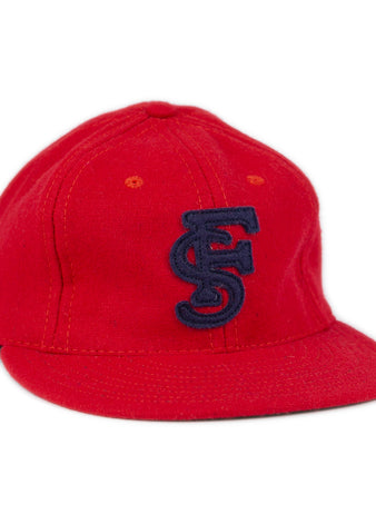 The Fresno State University 1951 Vintage Ballcap by Ebbets Field Flannels features a red flat brim and a navy blue embroidered FS logo, displayed against a white background.