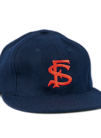 The Ebbets Field Flannels Fresno State University 1958 Vintage Ballcap is a navy genuine wool cap with red SF embroidery, a flat brim, and classic structured design.