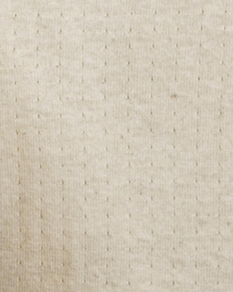 Close-up of the EFF Fungo Shirt - Navy Sleeves shows its beige wool blend fabric with a soft, slightly ribbed texture and a subtle grid pattern formed by small, evenly spaced raised dots.