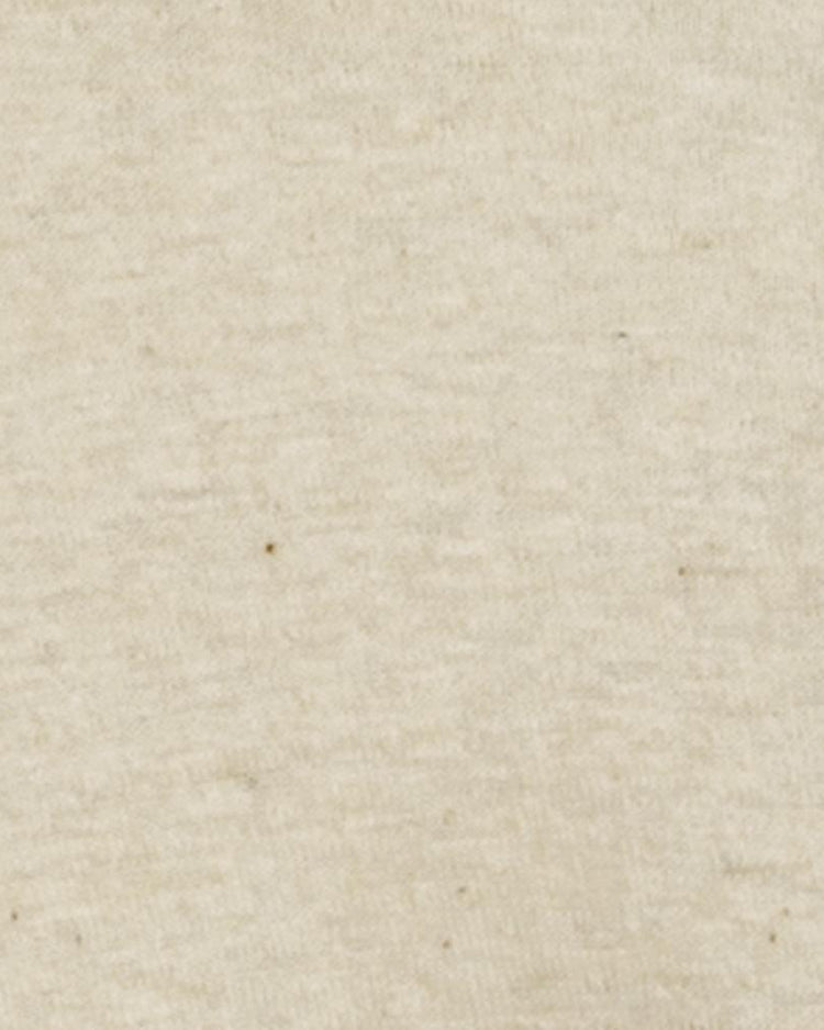 Close-up of the EFF Fungo Shirt - Navy Sleeves shows its light beige fabric with a subtle heathered texture and scattered dark specks, reminiscent of vintage flannel baseball uniforms. The material looks soft and smooth.