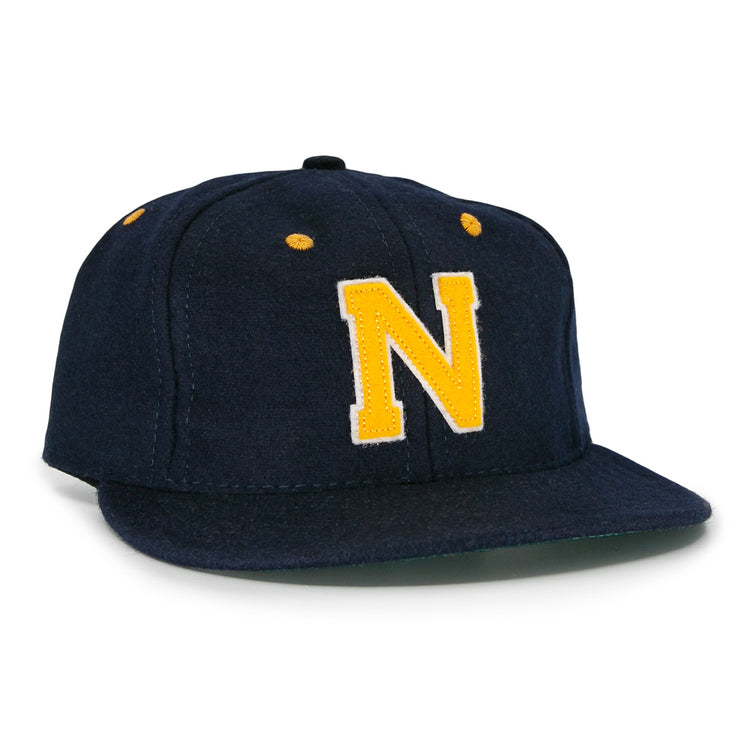 The EFF Great Lakes Naval Station 1944 Vintage Ballcap is a navy wool cap with yellow ventilation accents and a bold yellow N on the front, inspired by an authentic 1944 baseball design.