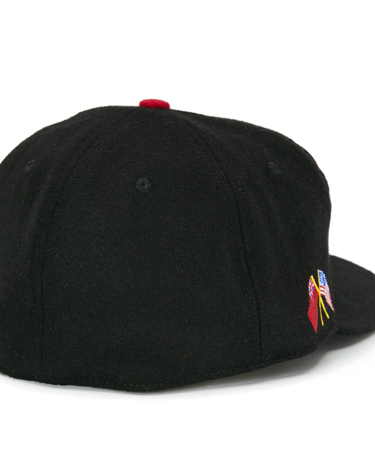 The EFF Galt Terriers 1961 Vintage Ballcap is a black wool hockey cap with small American and Filipino flag embroidery on the right near the back opening, inspired by classic Allan Cup and Ontario Senior Hockey League styles.