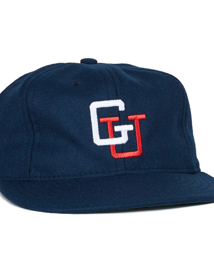 The EFF Gonzaga University 1971 Vintage Ballcap features navy blue fabric and overlapping white and red embroidered G and U letters, offering an authentic throwback to classic school spirit.