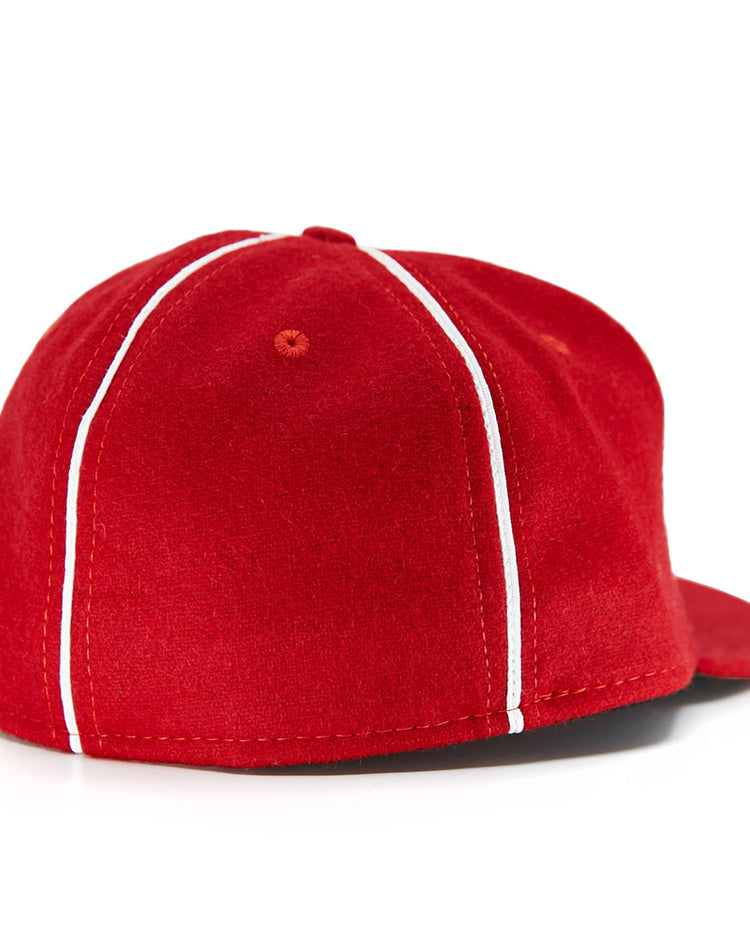 The EFF Indian Head Rockets (Jacksonville Eagles) 1952 Vintage Ballcap features two vertical white stripes running from the top to the brim, shown from the back.