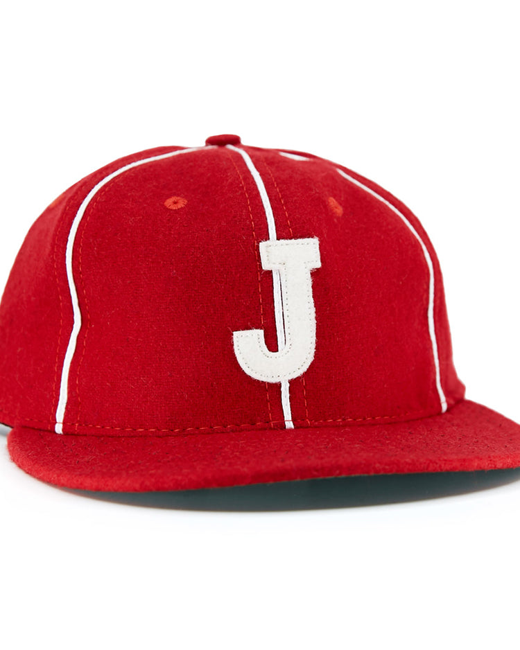 The EFF Indian Head Rockets (Jacksonville Eagles) 1952 Vintage Ballcap features a red design with white piping and a bold white J on the front, inspired by classic baseball styles.